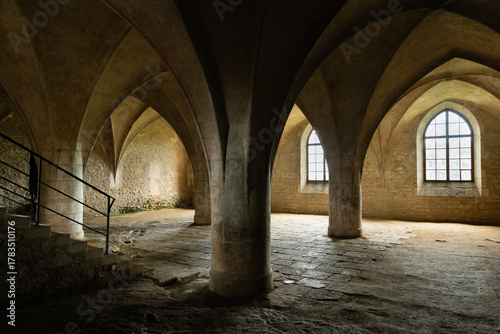 Kutná Hora, Czech Republic – August 8, 2025: Gothic interior of Corpus Christi Chapel with ribbed vaulting and stone columns in Kutná Hora, a medieval cemetery chapel from the 14th century