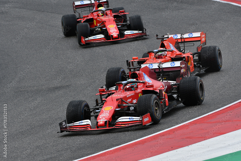 Obraz premium Scarperia; Italy - October 24th 2025: Ferrari SF1000 ex Sebastian Vettel and Charles Leclerc in action during Ferrari World Finals 2025 at Mugello Circuit in Italy.