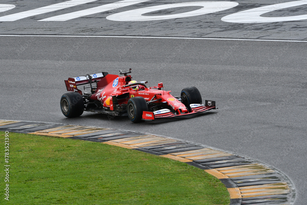 Obraz premium Scarperia; Italy - October 24th 2025: Ferrari SF1000 ex Sebastian Vettel and Charles Leclerc in action during Ferrari World Finals 2025 at Mugello Circuit in Italy.