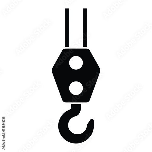 Black silhouette of a heavy duty crane hook and pulley system