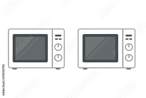 Identical household microwave ovens with digital control panels displayed side by side
