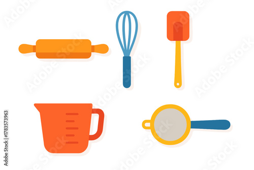 Collection of essential kitchen baking tools including rolling pin whisk spatula measuring cup and sieve