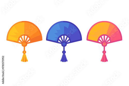 Set of three colorful traditional Asian folding fans with decorative tassels