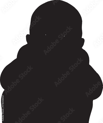 Silhouette of a baby wearing a thick winter jacket isolated