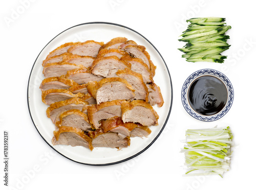 Traditional Peking Duck Slices with Cucumber, Scallion, and Sweet Bean Sauce on White Isolated Background – Chinese Cuisine