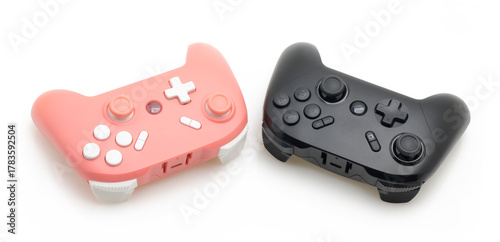 Pastel Pink and Black Gaming Controllers on White Isolated Background – Pair of Universal Gamepads for Video Games