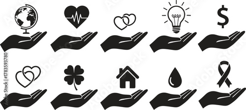 Hands holding global symbols of caring concept for the world issues