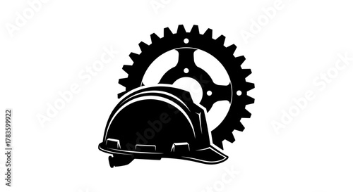 Black and white illustration of a hard hat in front of a gear, representing industry.