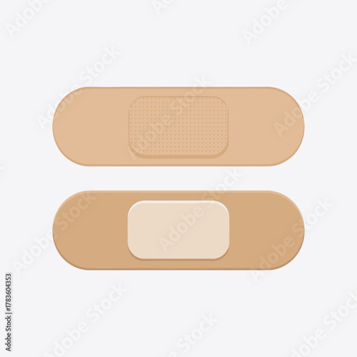Two adhesive bandages one with textured gauze pad and one with smooth pad on a light gray background.