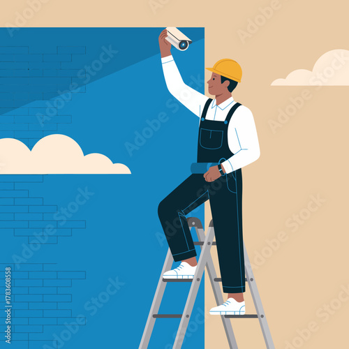 This image showcases a construction worker wearing a helmet installing a security camera, reflecting the importance of safety and surveillance in today's world.