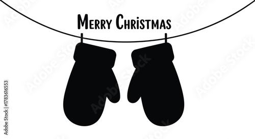 Simple black silhouette of two mittens hanging on a clothesline with merry christmas text above them