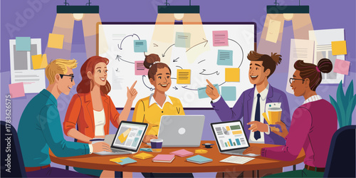 Diverse team collaborating around a table with laptops and sticky notes collaboration