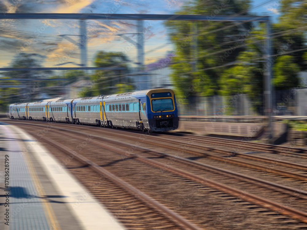 Fototapeta premium Passenger Train going through Summer Hill train station a suburban Sydney train Station NSW Australia
