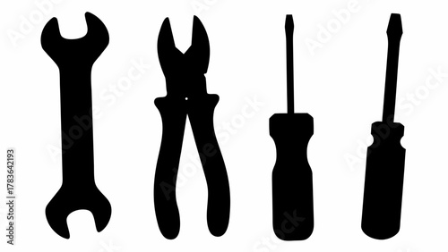 Black silhouettes of wrench, pliers, and two screwdrivers on a white background, tools isolated