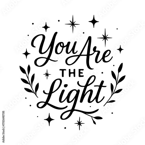 Inspirational hand lettered quote you are the light surrounded by stars and leaves