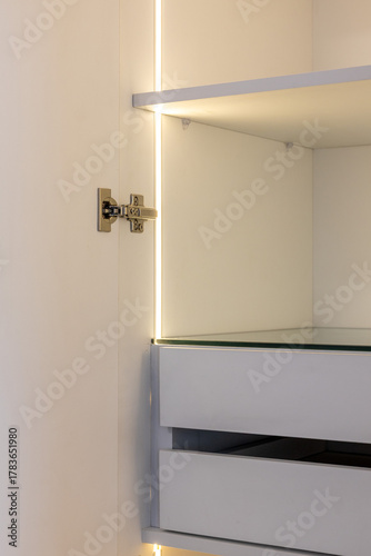 white wardrobe with drawers and led lights