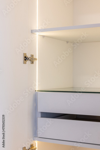 white wardrobe with drawers and led lights
