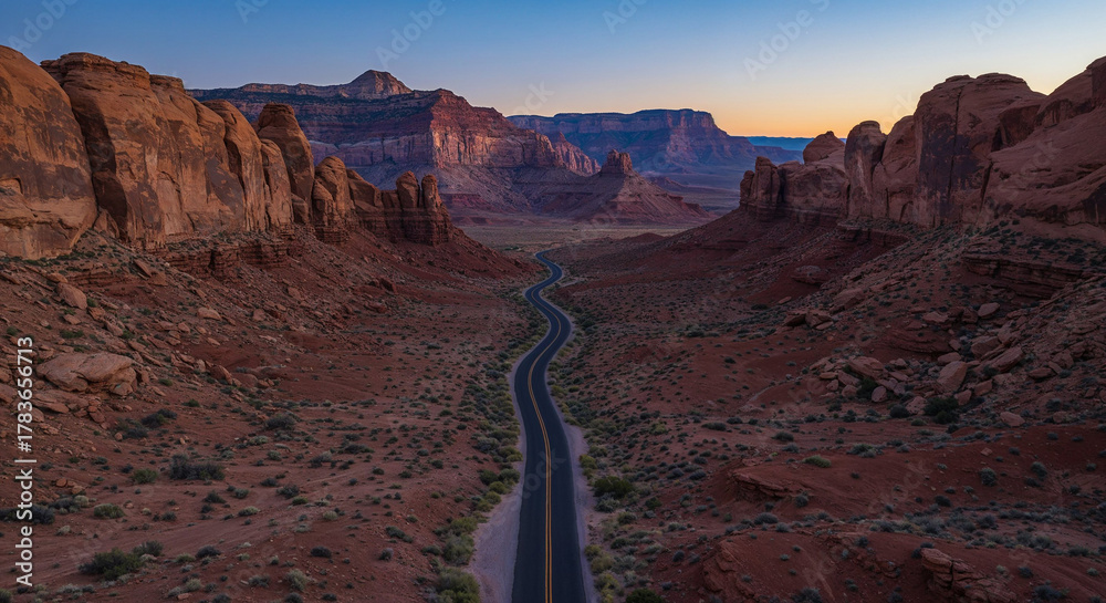 Obraz premium Drone Photography of Canyon Road Through American Southwest Red Rocks Landscape