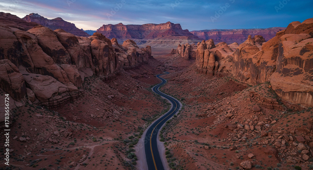 Obraz premium Drone Photography of Canyon Road Through American Southwest Red Rocks Landscape