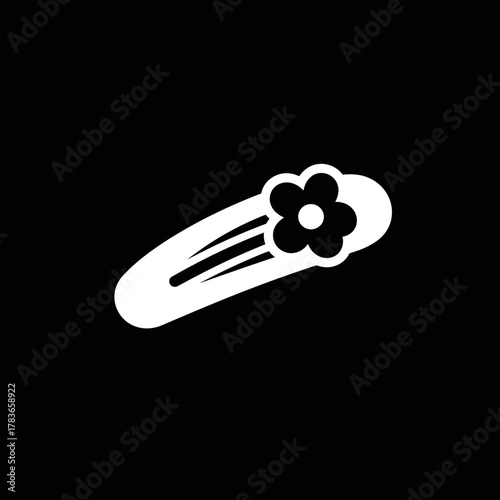 White on black icon of a hair clip barrette decorated with a flower accessory symbol