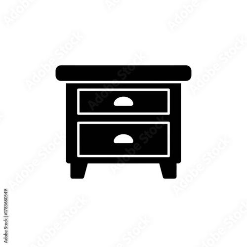 Black silhouette icon of a bedside table or nightstand with two drawers, representing bedroom furniture storage.