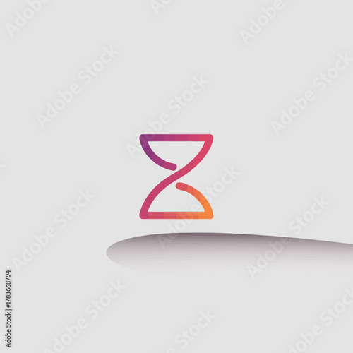 This image showcases a colorful hourglass symbol with a gradient effect, representing the passage of time and the beauty of transitions in life and experience.