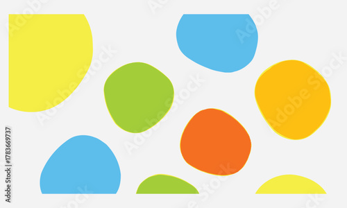 Abstract design featuring colorful, organic shapes in a pattern, creating a cheerful artistic feel