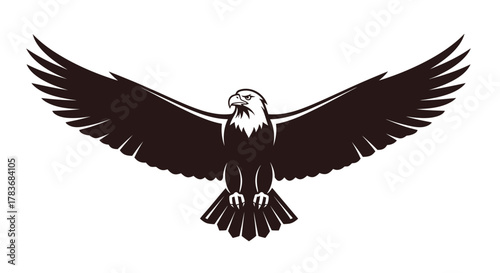 Majestic bald eagle soars with grace, wings spread in powerful emblem of freedom