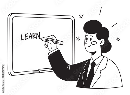 Female teacher writing the word "learn" on a whiteboard, symbolizing education and skill development.