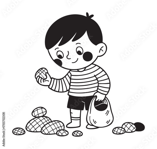 Young caucasian child with a striped shirt happily collecting potatoes into a bag.