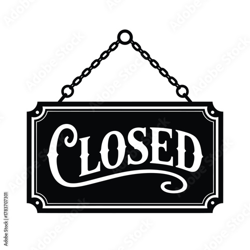 Classic black and white closed sign hanging on chain