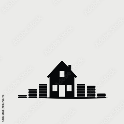Black silhouette of a house on a stack of coins