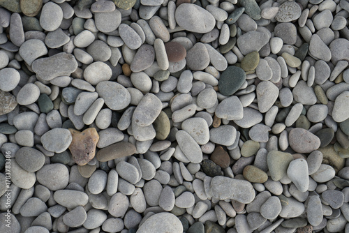 Smooth, Rounded Grey And Multicolored Beach Pebbles Create A Tranquil Natural Texture In Towyn, North Wales, Uk.