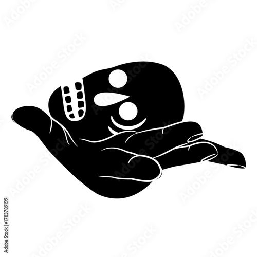Human hand holding a skull on open palm. Creative spooky design. Black and white silhouette.