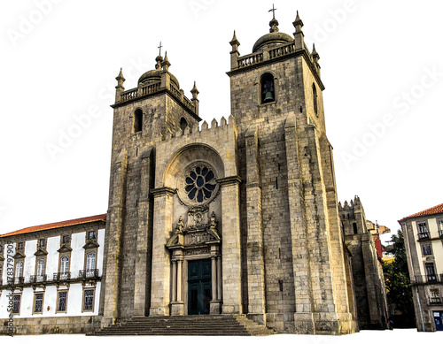 A large, ornate cathedral with twin towers and a rose window stands against a black background