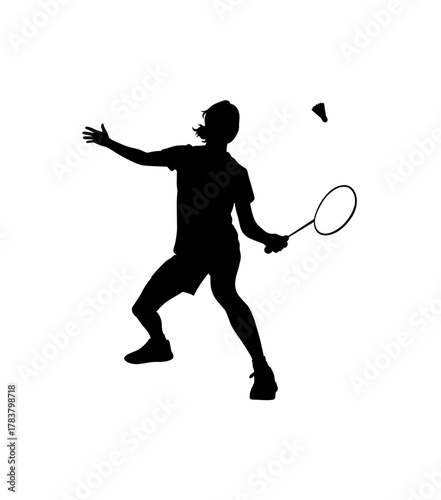 Silhouette of a badminton player in action hitting a shuttlecock during a match on a white background
