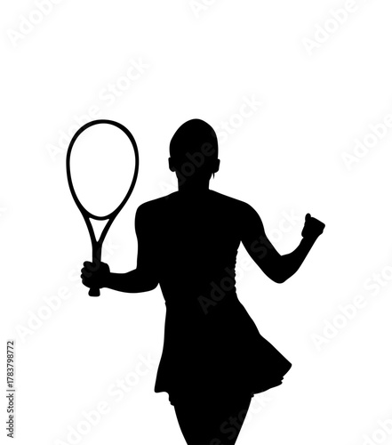 Silhouette of a female tennis player in a dress holding a racket and celebrating a victory with a raised fist