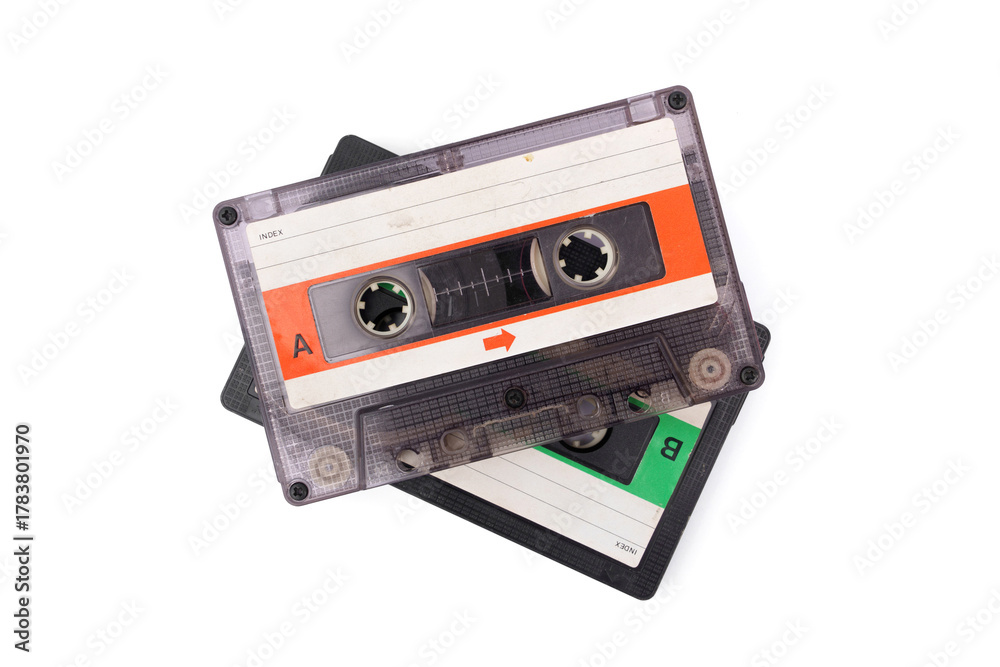Fototapeta premium Old transparent compact vintage audio. Cassette tapes stacked isolated on white background.