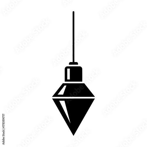 Plumb bob hanging from a string for construction.