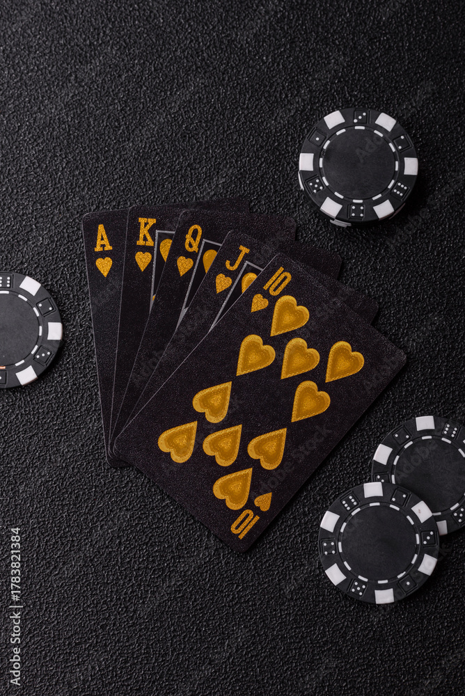 Obraz premium Playing card game poker in casino with chips, bets and risk. Cards and chips on black felt