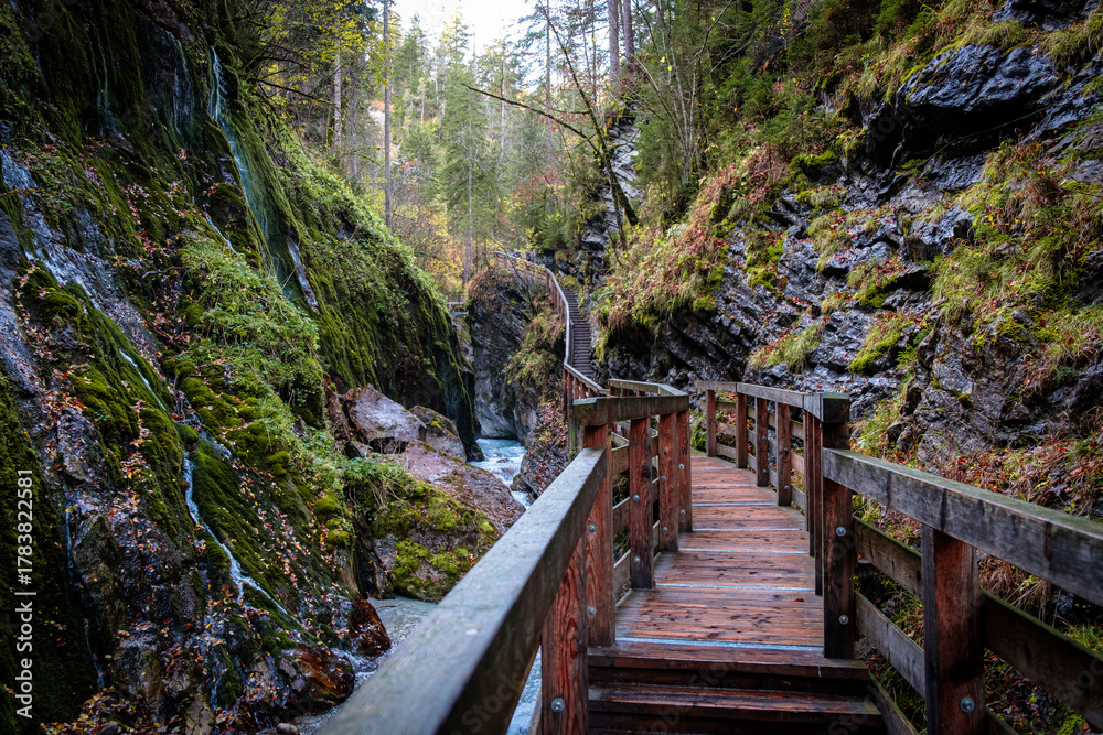 Fototapeta premium Vibrant Autumn Scenery at Wimbachklamm Gorge, Southern Germany
