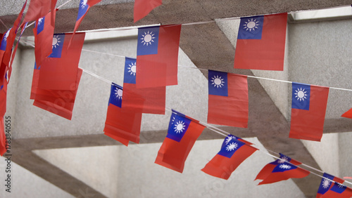 Taiwan flags hanging rows outdoors, symbolizing patriotism and unity in public