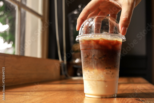 Coffee latte, coffee with milk. coffee two tone brown and white on table in cafe, refreshing drink menu for the morning