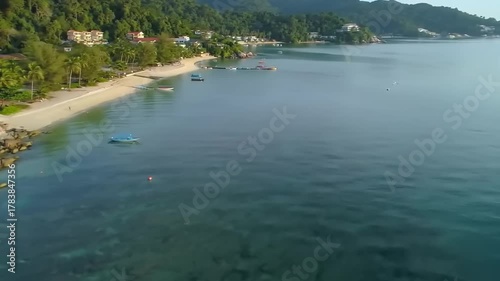 Coastal scene with a beach and boats