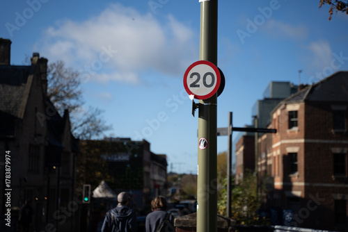 Urban street with speed limit sign