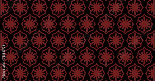 Dark red geometric seamless pattern with repeating ornamental shapes forming a bold decorative texture.