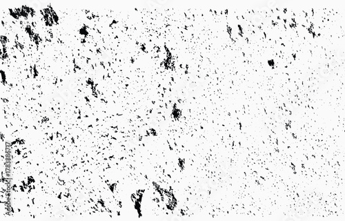 Grunge texture vector featuring a distressed surface in black and white with uneven patterns creating a rugged appearance ideal for various design projects