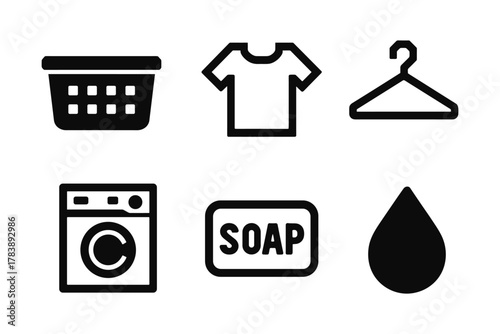 Laundry icons set: basket, shirt, hanger, washing machine, soap, water drop in black linear style