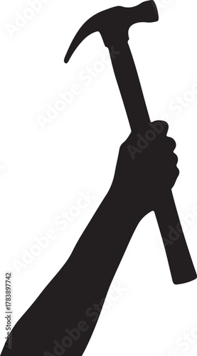 Silhouette of hand holding a hammer high symbolizing strength construction