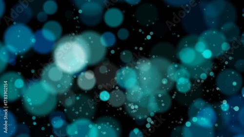 Abstract blurred bokeh in blue tones with light particles on dark background.. This video includes a transparent Alpha Channel. ProRes 4444.	